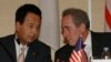 美国贸易代表弗罗曼和日本内阁府特命担当大臣甘利明（资料照）