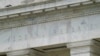 FILE - The facade of the U.S. Federal Reserve (central bank) building is seen in Washington, May 4, 2021. 