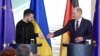 Канцлер Германии Олаф Шольц (справа) и президент Украины Владимир Зеленский после их пресс-конференции в Берлине, 16 февраля 2024 года (Photo by John MACDOUGALL / AFP).