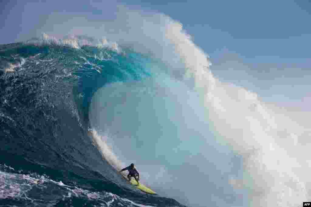 Ryan Hippo Hipwood of Australia competes in the Peahi Challenge off the coast of the Maui Island in Hawaii, Oct. 28, 2017.