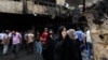 Iraqi women wait to hear about family members who went missing after a truck bomb hit Karrada, a busy shopping district in the center of Baghdad, Iraq, July 3, 2016. 
