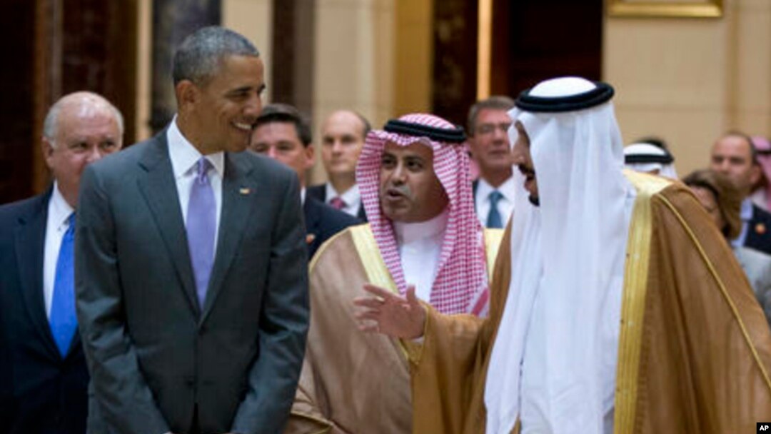 President Barack Obama and Saudi Arabia's King Salman walk to President Obama's motorcade after meeting at Erga Palace in Riyadh, Saudi Arabia, Wednesday, April 20, 2016. The president began a six day trip to talk with his counterparts in Saudi Arabia, England and Germany. (AP Photo/Carolyn Kaster)