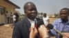 Head of the Central African Republic's government delegation to the peace talks, Jean Willybiro Sako, speaks to the media at the airport in Bangui, Central African Republic Monday, Jan. 7, 2013.