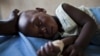 Girl with malaria South Sudan (2012 photo) 