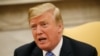 President Donald Trump speaks in the Oval Office at the White House in Washington, July 2, 2018. 