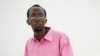 Somali journalist Abdiaziz Abdinuur Ibrahim (left) in court in Mogadishu, February 5, 2013.