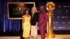 Golden Globes President Helen Hoenhe and actors Mindy Kaling and Morris Chestnut pose during nominations announcement for the 82nd Golden Globe Awards in Beverly Hills, California, Dec. 9, 2024. 
