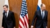 FILE - US Secretary of State Antony Blinken, left, and Russian Foreign Minister Sergey Lavrov move to their seats before their meeting, Jan. 21, 2022, in Geneva. 