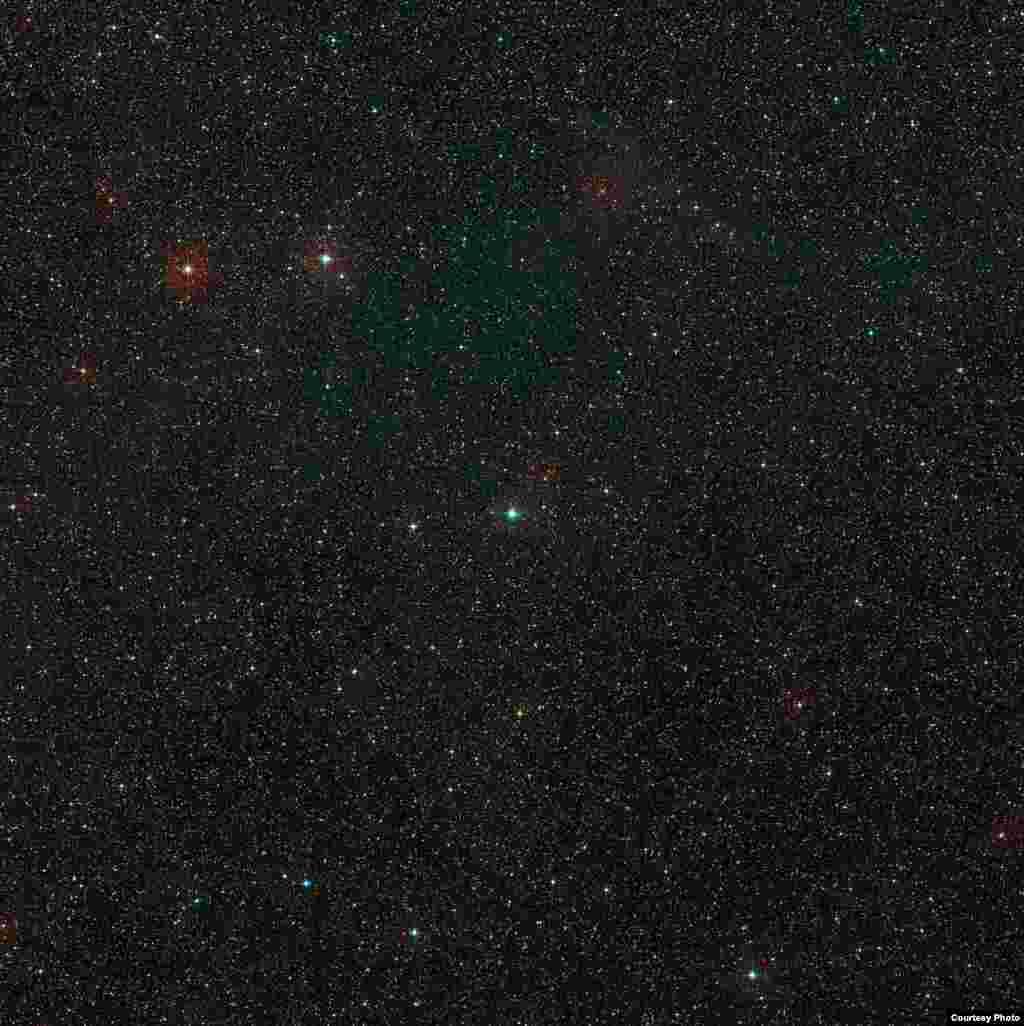 The sky around the young star HD 100546 in the southern constellation of Musca. (ESO/Digitized Sky Survey 2. Davide De Martin)