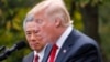 Singapore's Prime Minister Lee Hsien Loong and U.S. President Donald Trump give joint statements in the Rose Garden of the White House in Washington, Oct. 23, 2017. 