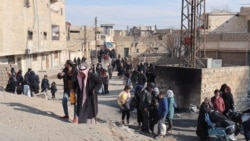 Suriyaning Hasaki hududida aholi "Islomiy davlat" va kurd jangchilari orasidagi urushdan qochmoqda, 22-yanvar, 2022
