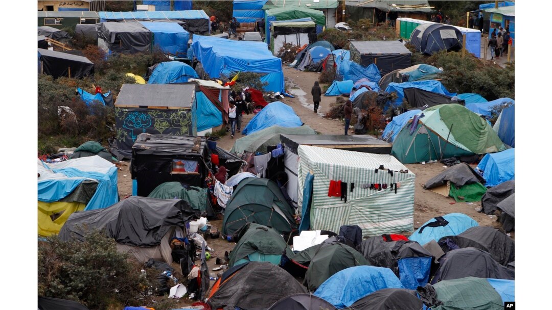 FILE - A view of the migrant camp known as the new Jungle in Calais, northern France, Oct. 21, 2015.