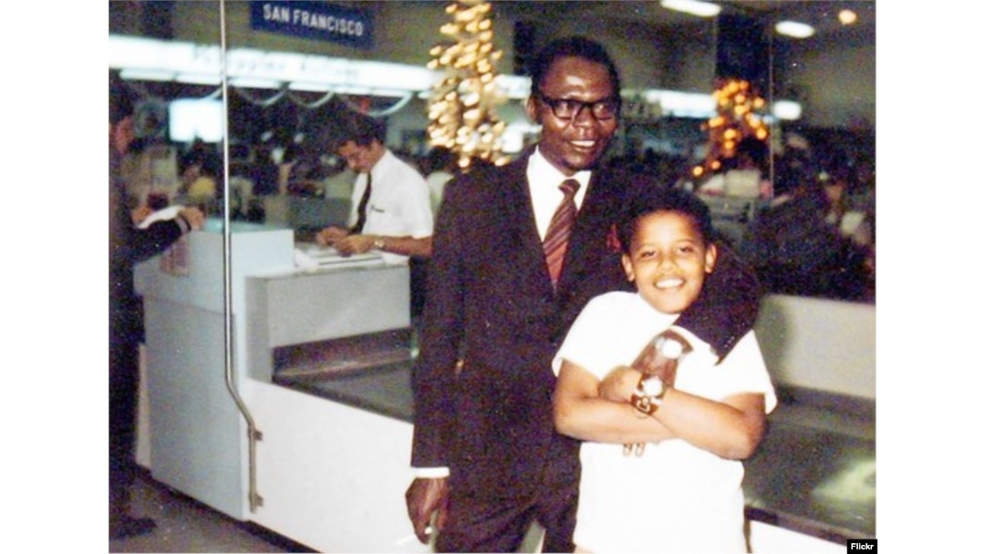 Young Barack Obama with his father