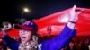 Supporters hoist a giant Taiwan national flag during a campaign rally of Kuomintang (KMT) ahead of Taiwan's presidential election, in Taipei, Taiwan, on Dec. 23, 2023.