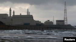 TEPCO's Kashiwazaki Kariwa nuclear power plant, the world's biggest, is seen from a seaside in Kashiwazaki, November 12, 2012. 