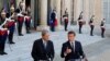 FILE - French President Emmanuel Macron meets Italian Prime Minister Paolo Gentiloni at the Elysee Palace in Paris, France, May 21, 2017. 