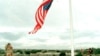 FILE - U.S. Marines raise the American flag over the reclaimed U.S. Embassy in Mogadishu.