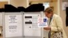 A woman casts her ballot in the District of Columbia in the final 2016 U.S. Democratic primary of the year, June 14, 2016. 