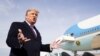 U.S. President Donald Trump talks to reporters prior to boarding Air Force One as he departs Washington to campaign in California from Joint Base Andrews in Maryland, Feb. 18, 2020.