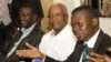 Uganda opposition leaders, from left to right: Forum for Democratic Change, Dr. Kizza Besigye, former Prime Minister Amama Mbabazi and Democratic Party President Norber Mao meeting at the Democratic Alliance office in Kampala, Sept. 18, 2015.