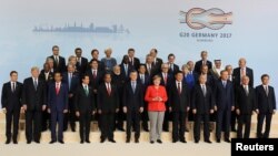 Líderes mundiais na cimeira do G20 em Hamburgo, Alemanha, Julho 7, 2017.