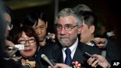 U.S. economist and Nobel laureate Paul Krugman reacts to questions from journalists after a meeting with Japanese Prime Minister Shinzo Abe in Tokyo, March 22, 2016. Krugman spoke Thursday at the Peterson Institute for International Economics in Washington and to VOA.