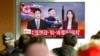 FILE - People watch a TV broadcasting a news report on North Korea's firing of what appeared to be an intercontinental ballistic missile that landed close to Japan, in Seoul, South Korea, Nov. 29, 2017. 