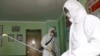 Offices at the Phyongchon District People's Hospital are disinfected to help curb the spread of the coronavirus, April 1, 2020, in Pyongyang, North Korea. 