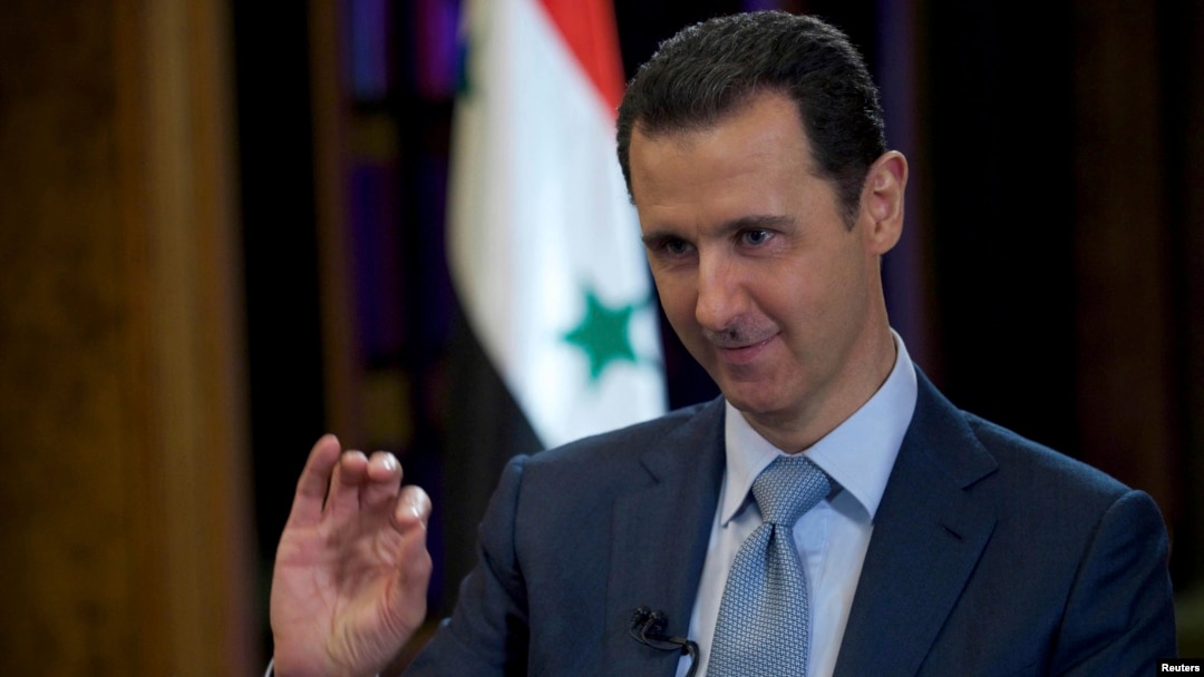 FILE - Syria's President Bashar al-Assad in Damascus, Feb. 9, 2015.