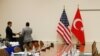 FILE - A U.S. and a Turkish flag are seen ahead of the start of a meeting between American and Turkish officials in Brussels, Belgium, Dec. 20, 2015. Thursday's bilateral talks will be held in Washington.