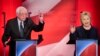 Sen. Bernie Sanders of Vermont reacts to former Secretary of State Hillary Clinton's answer to a question during a Democratic presidential primary debate hosted by MSNBC at the University of New Hampshire in Durham, Feb. 4, 2016.