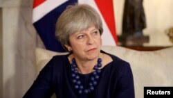Britain's Prime Minister Theresa May is seen at 10 Downing Street, London, Dec. 5, 2017.