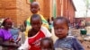 Internally displaced children, who are escaping the violence, pose at Bangui's Saint Paul's Church December 17, 2013. Some European countries will send troops to support a French-African mission to restore order in Central African Republic, French Foreign