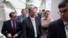 Speaker of the House John Boehner of Ohio, is surrounded by reporters on Capitol Hill in Washington, Aug. 1, 2014, after a closed-door meeting of House Republicans to discuss the border crisis. 