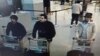 A screengrab of airport CCTV footage released by Belgian federal police shows suspects in the attacks at Brussels Airport, in Zaventem, March 22, 2016. Police is seeking help in identifying the "man in the hat" on the right.