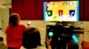 Kids play the University of Utah’s Patient Empowerment (PE) video game, September 19, 2012. (University of Utah)
