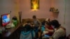 Nine children and three adults pack into this small apartment after fleeing violence in the disputed area of Nagorno-Karabakh last week. Pictured in Yerevan, Armenia on Oct. 6, 2020. (Yan Boechat/VOA)