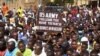 FILE - Nigeriens gather in a street to protest against the U.S. military presence, in Niamey, Niger April 13, 2024. 