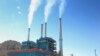 FILE - Smoke rises from the Colstrip Steam Electric Station, a coal burning power plant in in Colstrip, Montana.