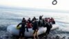 Migrants arrive at the village of Skala Sikaminias, on the Greek island of Lesbos, after crossing on a dinghy the Aegean sea from Turkey, March 2, 2020.