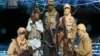 An image grabbed on Dec. 24, 2012 a video released by the radical Islamist group known as Ansaru, reportedly shows armed members of the group posing in an undisclosed place in November 2012. The group claimed responsibility for the recent kidnapping of a 