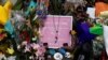 A flower tribute is seen outside Al Noor mosque where more than 40 people were killed by a suspected white supremacist during Friday prayers on March 15, in Christchurch, New Zealand March 27, 2019. 