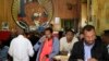 Customers drink coffee as they read newspapers at the Tamoka coffee bar in Ethiopia's capital Addis Ababa, Sept. 16, 2013. 
