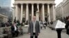 In this photo taken Nov. 2, 2017, Hubertus Vaeth, the managing director of Frankfurt Main Finance poses for a portrait outside the Royal Exchange in the City of London. With London-based banks, insurers and asset managers all scrambling to prepare for Britain's exit from the European Union, Hubertus Vaeth is putting out Frankfurt's welcome mat for any financial service refugees who are looking for an EU base after Brexit in March 2019. 