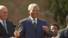 FILE - President Nelson Mandela dances at a celebration concert following his inauguration at the Union Buildings in Pretoria, South Africa, May 10, 1994.