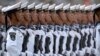 FILE - Soldiers from China's People's Liberation Army (PLA) Navy march in formation in Beijing, Oct. 1, 2019. China's former Navy chief Dong Jun was named its new defense minister on Dec. 29, 2023.