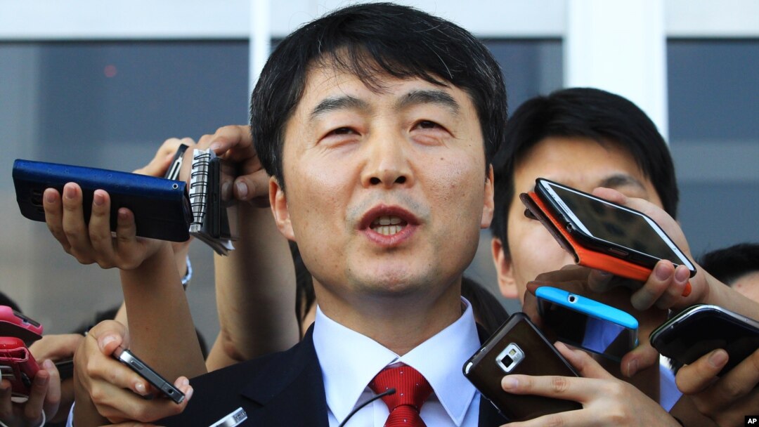 Lee Seok-ki of the leftist Unified Progressive Party speaks before leaving the National Assembly in Seoul, South Korea, Sept. 4, 2013. 
