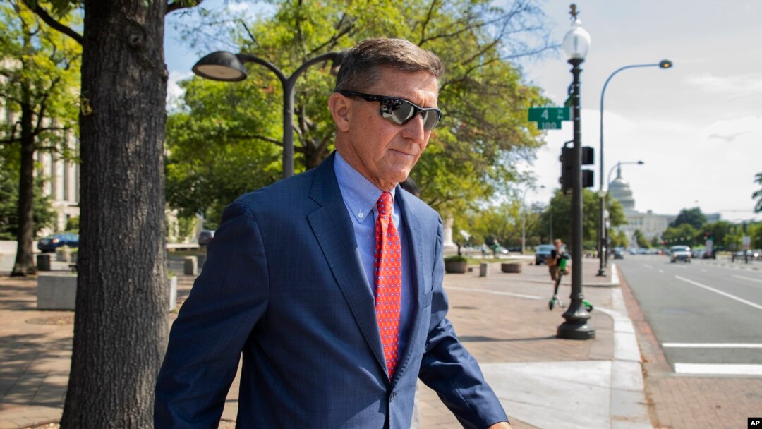 FILE - In this Sept. 10, 2019, photo, Michael Flynn, President Donald Trump's former national security adviser, leaves the federal court in Washington. 