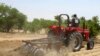 A farmer plows the field in Saulawa village, on the outskirts of Nigeria's north-central state of Kaduna, May 2013 file photo. 