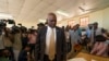 Botswana's President Mokgweetsi Masisi arrives to vote in general elections in Moshupa, Botswana, Oct. 23, 2019. On Tuesday Masisi announced a state of emergency after the African country recorded its first confirmed COVID-19 cases.